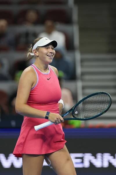 BEIJING, CHINA - OCTOBER 02: Amanda Anisimova of the United States reacts during the Women's singles Quarterfinal match against Qinwen Zheng of China on day 10 of the China Open at National Tennis Center on October 2, 2024 in Beijing, China. (Photo by Emmanuel Wong/Getty Images)