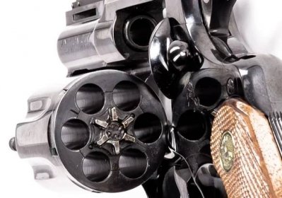 Colt 2.5-inch snub nosed Python revolver in a lightbox