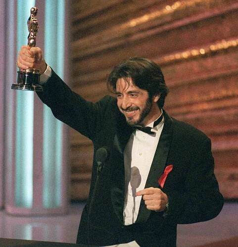 Al Pacino holds up his Best Actor Oscar for 'Scent of a Woman' onstage during the 65th Annual Academy Awards in L.A. on March 29, 1993