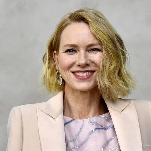 Naomi Watts shows how stripes bring life to a neutral living room – no makeover needed, just a pillow or throw