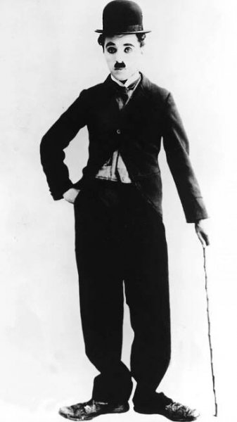 “The beloved character actor, Charlie Chaplin, in a dynamic pose” Wallpaper