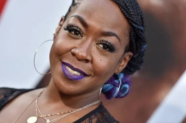 Tichina Arnold posing in a dress at 'The Equalizer 2' premiere.