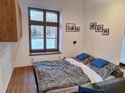 Postel nebo postele na pokoji v ubytování Apartmán Ostrůvek