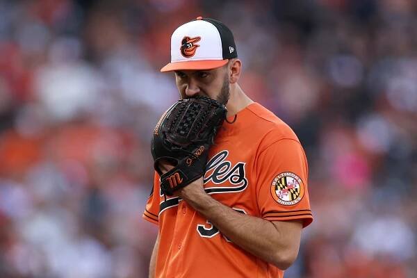Grayson Rodriguez of the Baltimore Orioles reacting to a play against the Texas Rangers during the second inning of Division Series Game Two.