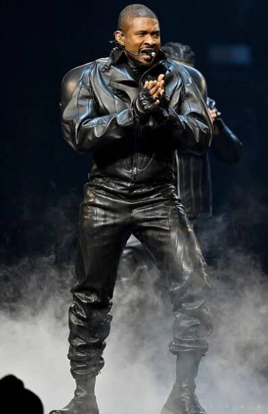 Singer Usher performs during his Past Present Future tour at State Farm Arena