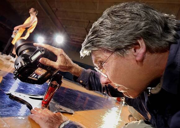 Dave Black photo of himself shooting from the floor, looking upwards, of a basketball player on the court