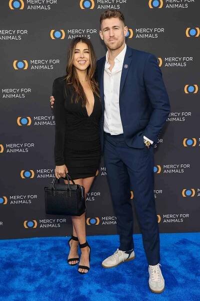 LOS ANGELES, CALIFORNIA - APRIL 20: Daniella Monet (L) and Andrew Gardner (R) attend the 2024 Mercy For Animals Hope Gala at Rolling Greens on April 20, 2024 in Los Angeles, California.