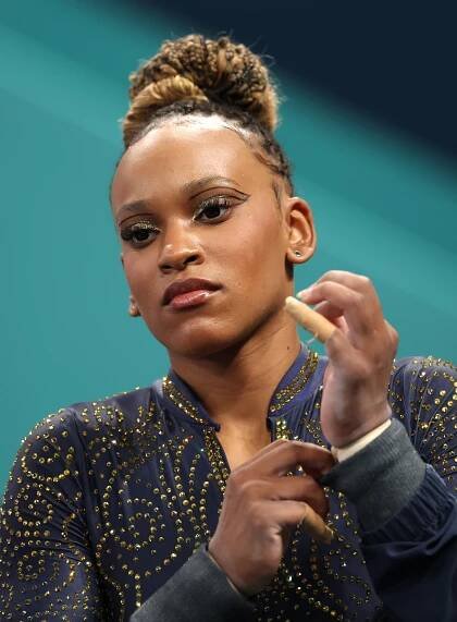 Rebeca Andrade of Team Brazil wearing metallic graphic eyeliner