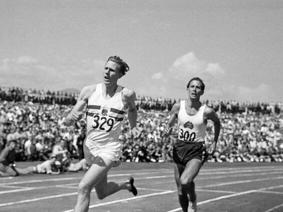 The 1954 British Empire Games in Vancouver, Canada. Roger Bannister pulls ahead of John Landy in a race dubbed "the mile of the century." (Photo by Ralph Morse/Time Life Pictures/Getty Images)