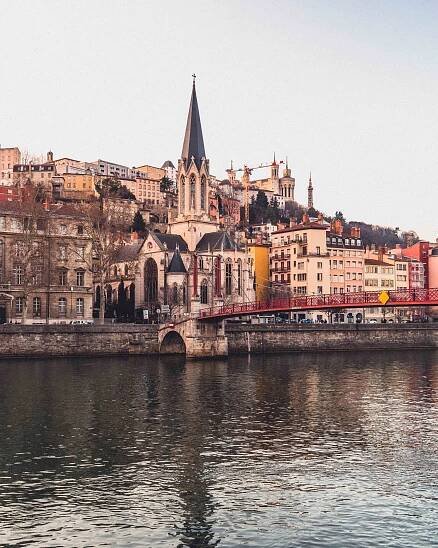 Here's why you need to visit Lyon in the East of France: reasons to go to the foodie capital of France, including murals, the fete des lumieres, architecture, and hidden gems!