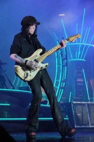 Mick Mars played the guitar in
