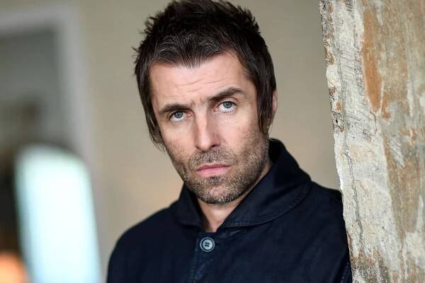 Liam Gallagher Seems to Joke About Snorting Drugs as He's Spotted Using Porta-Potty Before Oasis' London Show