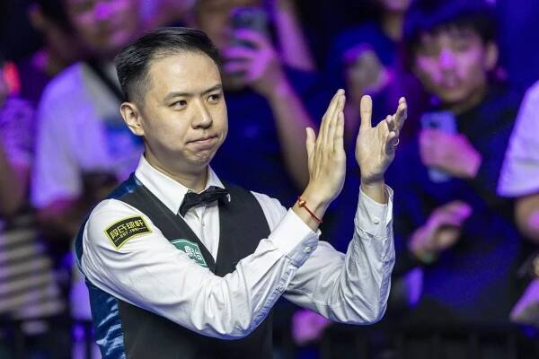 WUHAN, CHINA - AUGUST 30: Xiao Guodong of China celebrates after winning the final match against Gary Wilson of England on day seven of the WST 2025 Wuhan Open at the Optics Valley Gymnasium of Huazhong University of Science and Technology on August 30, 2025 in Wuhan, China. (Photo by Yu Chun Christopher Wong/Eurasia Sport Images/Getty Images)