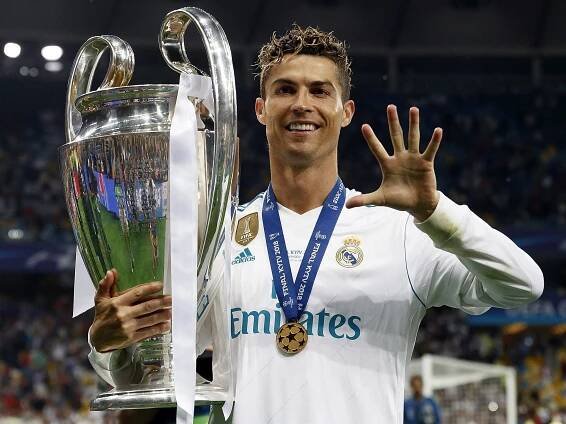 Cristiano Ronaldo holding the Champions League trophy