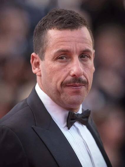 A Man In A Tuxedo With A Mustache