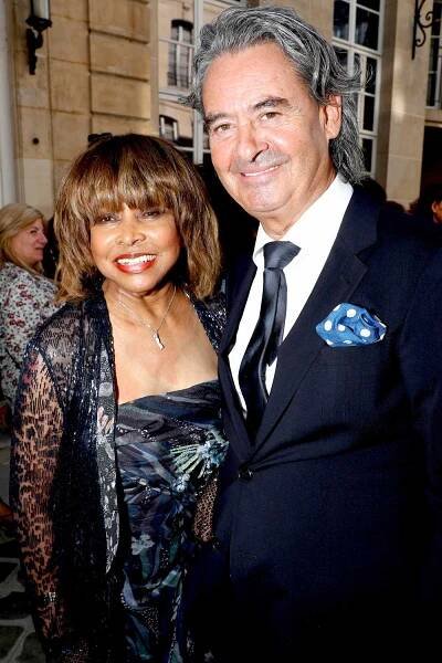  Singer Tina Turner and her husband Erwin Bach attend the Giorgio Armani Prive Haute Couture Fall Winter 2018/2019 show as part of Paris Fashion Week on July 3, 2018 in Paris, France. 