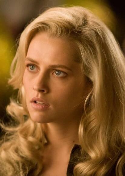 a woman with blonde hair and blue eyes