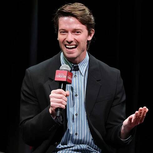 Patrick Schwarzenegger speaks onstage during SAG-AFTRA Foundation Conversations - The White Lotus at 