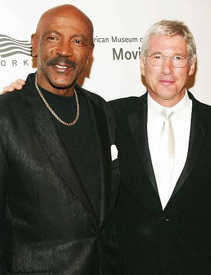 Honoree Richard Gere and actor Louis Gossett Jr. pose together at the American Museum Of The Moving Image Salute To Richard Gere at The Waldorf-Astoria Hotel April 20, 2004 in New York City. 