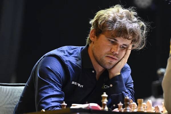 Magnus Carlsen plays in World Blitz Chess Championship after resolving jeans controversy