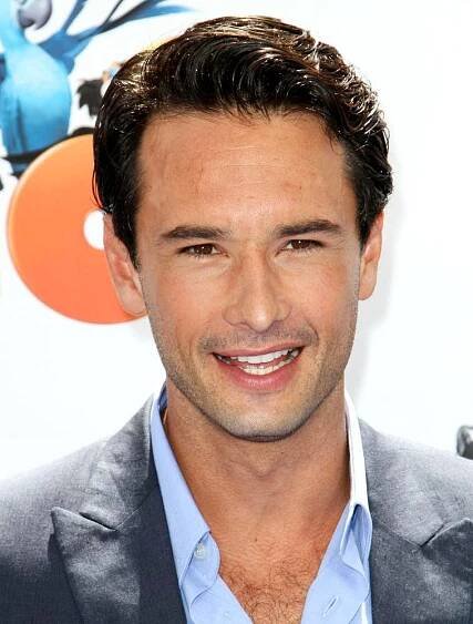 A Radiant Rodrigo Santoro Flashing His Signature Smile. Wallpaper