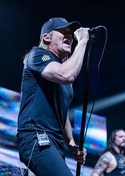 Brad Arnold of 3 Doors Down performing on stage at Little Caesars Arena in Detroit, Michigan on November 20, 2024