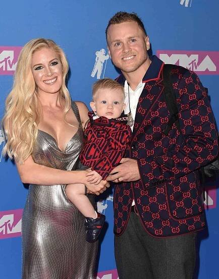 Heidi and Spencer Pratt pose for a photo with their baby, Gunner Pratt