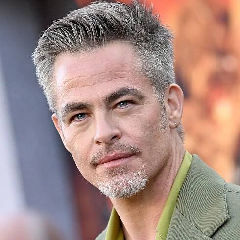 Chris Pine’s Hair Has Reached Peak Surf Daddy — See the Photos