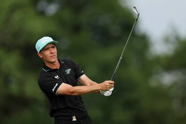 Carlos Ortiz, who is four shots off the lead, hits an iron shot during the third round of the U.S. Open.