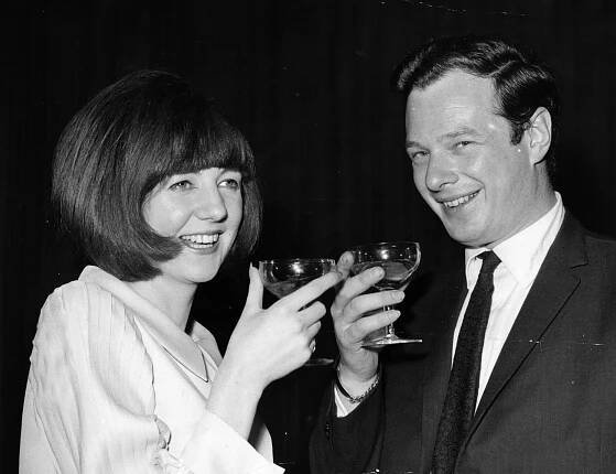May 27, 1964: Singer Cilla Black with her manager Brian Epstein at a 21st Birthday party for Cilla at the London Palladium