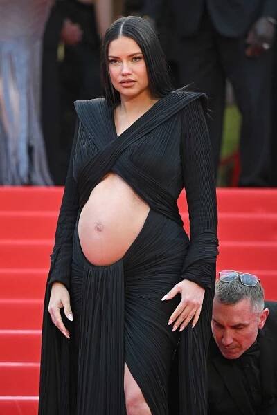 Pregnant Adriana Lima Shows Off Bare Bump in Cut Out Dress at Cannes 2022 with Boyfriend