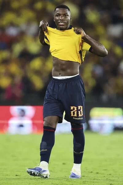 Moises Caicedo leaves the soccer field after receiving a red card.