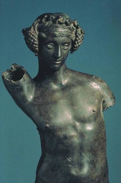 Statuette en bronze de Bacchus, du IIe siècle apr. J.-C. (AVENTICUM - Site et Musée romains d'Avenches).