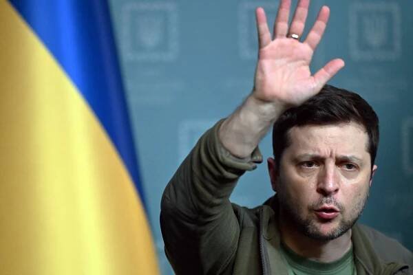 Ukrainian President Volodymyr Zelensky gestures during a Thursday press conference. 