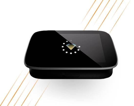A sleek NGRAVE ZERO hardware wallet with a circular LED display on top, featuring orange diagonal lines in the background.