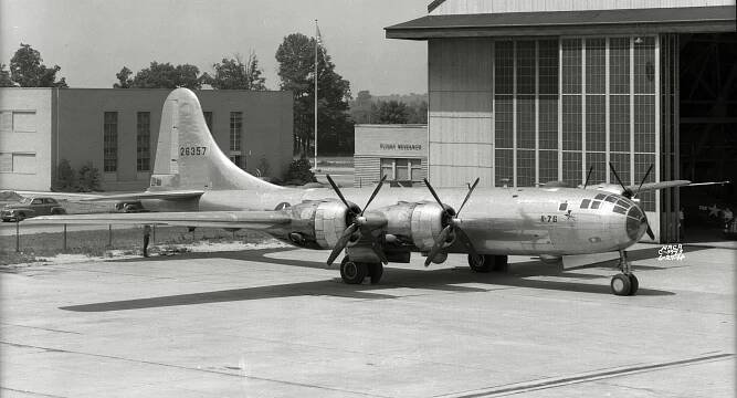 B-29 bomber on tarmac.