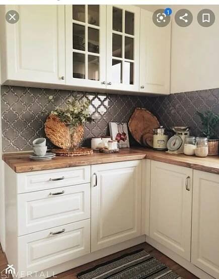 the kitchen is clean and ready to be used for cooking or baking, as well as other things on the counter
