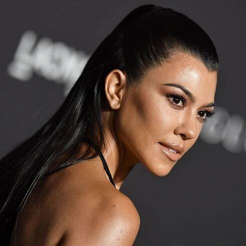 Kourtney Kardashian Matched Her Manicure to Travis Barker's Tooth Gems — See Photos