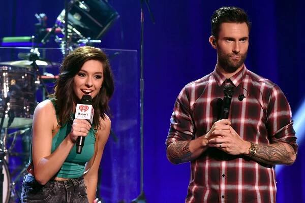 BURBANK, CA - AUGUST 26: Singers Christina Grimmie (L) and Adam Levine speak onstage druing the iHeartRadio Album Release Party with Maroon 5 LIVE on the CW at iHeartRadio Theater on August 26, 2014 in Burbank, California. (Photo by Kevin Winter/Getty Images for Clear Channel)