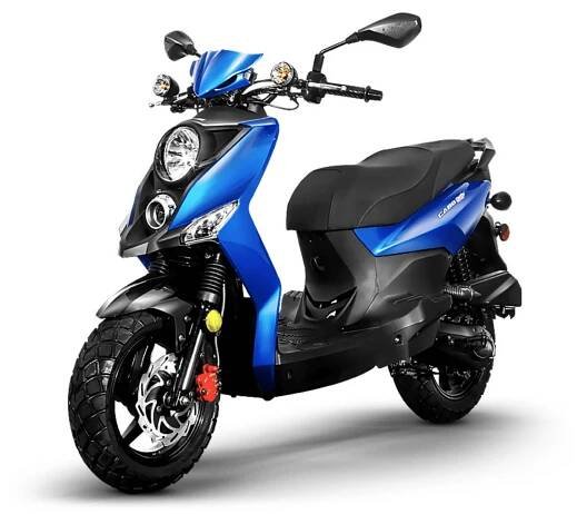 A blue scooter is parked on the ground.