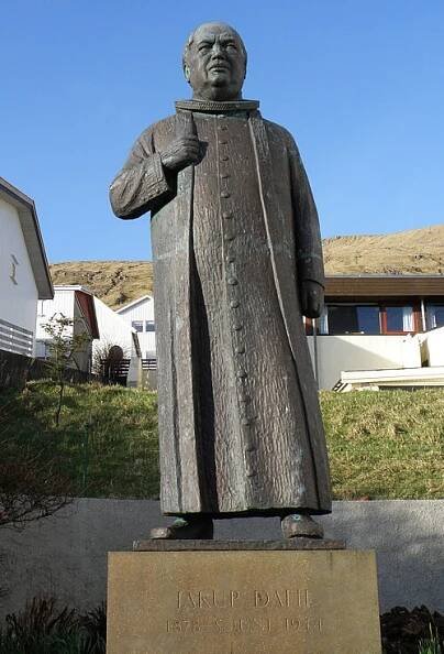 Statue in memory of Jákup Dahl, located in front of the church of Vágur.