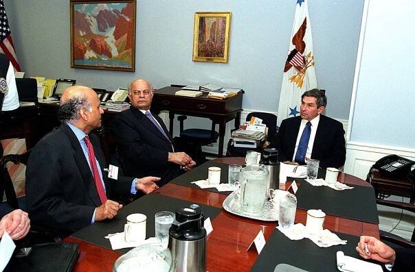 Indian Ambassador to the U.S. Lalit Mansingh (left) comments during a meeting of India's National Security Advisor Brajesh Mishra (center) and Deputy Secretary of Defense Paul Wolfowitz (right) at the Pentagon on Sept. 24, 2001.