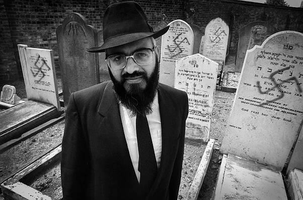 Headshot Photo Of Man In Cemetery