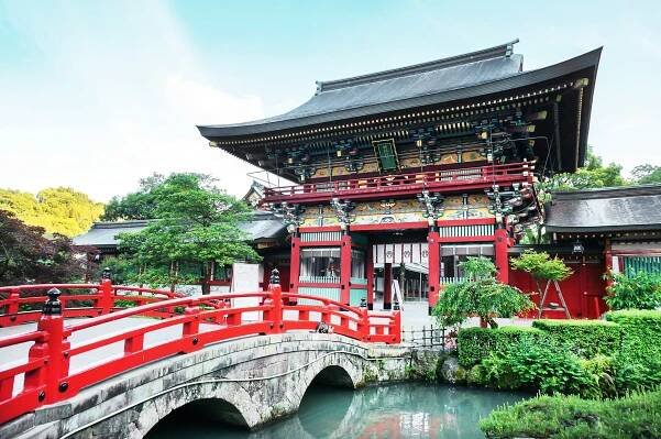 The vibrant Yutoku Inari Shrine in Nagasaki, surrounded by lush greenery, invites spiritual exploration and cultural appreciation | MSC Cruises