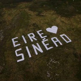 Sinead O’Connor hillside tribute unveiled close to town where singer will be buried