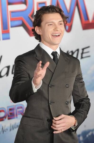Tom Holland at an event for Spider-Man: Bez domova (2021)