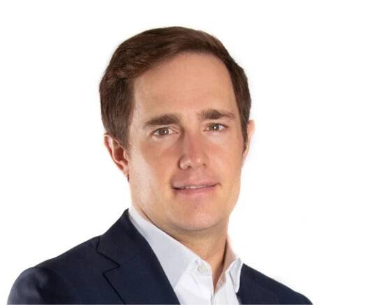 Porträtbild, John Carlson, Leiter Group Investors Relations
