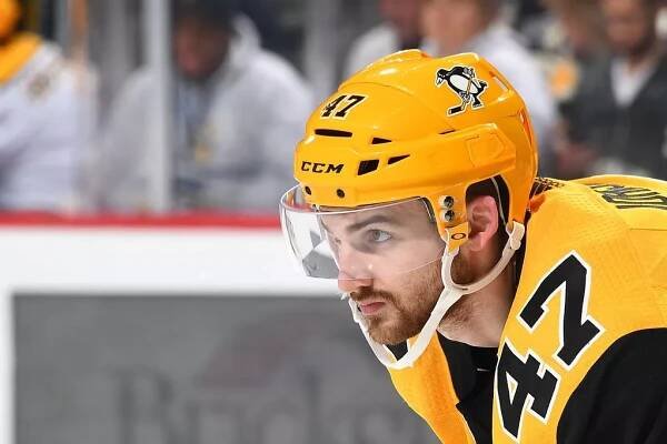  Adam Johnson #47 of the Pittsburgh Penguins skates against the Nashville Predators at PPG Paints Arena