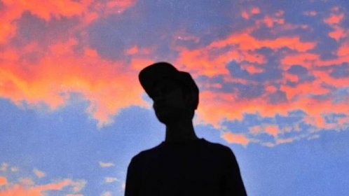 Clouds behind a silhouette of a person, to represent severe depression