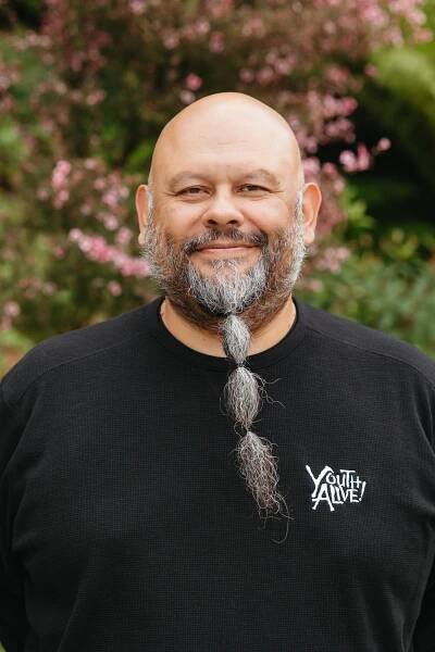 Headshot of Associate Director John Torres